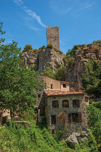 Close-up of houses facing the garden and cliff in Châteaudouble, a quiet and tourist village with medieval origin on a sunny. Located in the Var department, Provence region, southeastern France