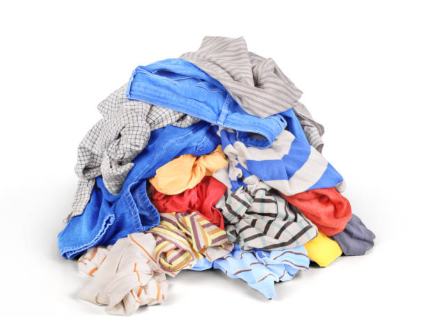 istock Pile of clothes isolated on white background 826838054