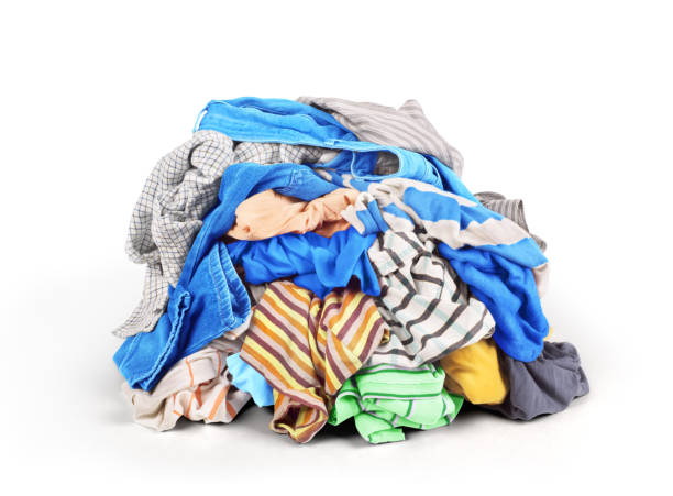 istock Pile of clothes isolated on white background 826838090