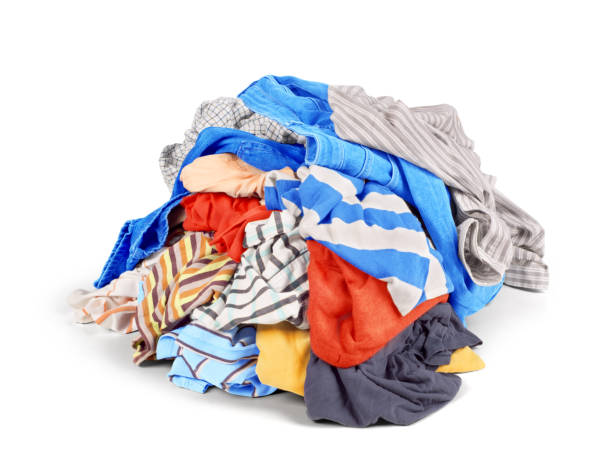 istock Pile of clothes isolated on white background 826838208
