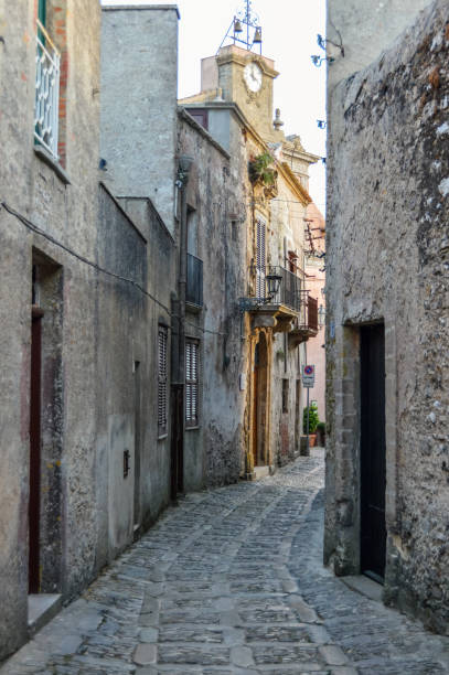 istock Ancient medieval cobblestone street in Erice, Sicily, Italy 826841004
