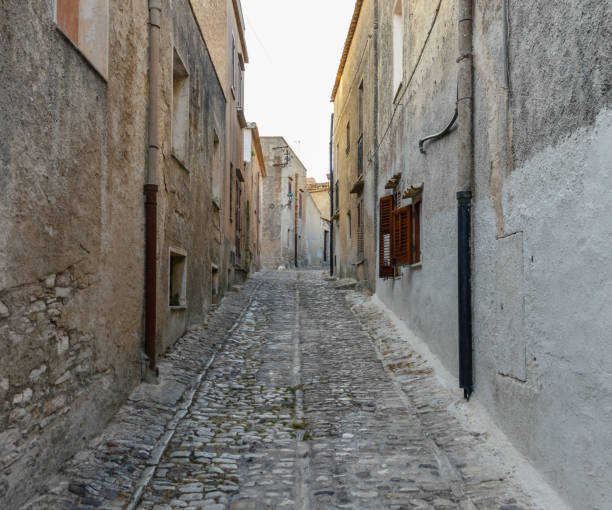istock Ancient medieval cobblestone street in Erice, Sicily, Italy 826841114