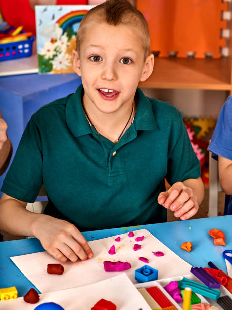 istock Plasticine modeling clay in children class in school. 826852486