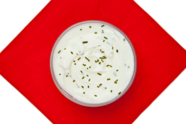 istock Bowl of dip with herbs on a red napkin 826855012