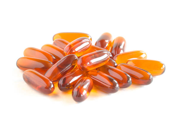 lezithin gel vitamin kapseln zu ergänzen. - lecithin capsule brown vitamin pill stock-fotos und bilder