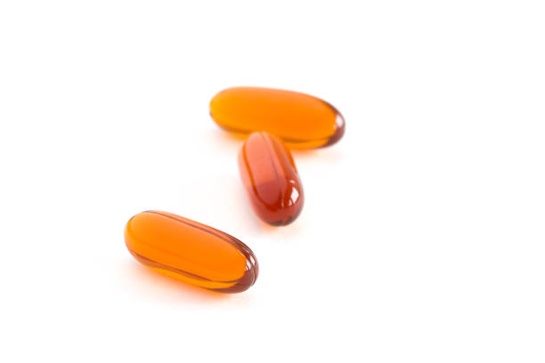 lezithin gel vitamin kapseln zu ergänzen. - lecithin capsule brown vitamin pill stock-fotos und bilder