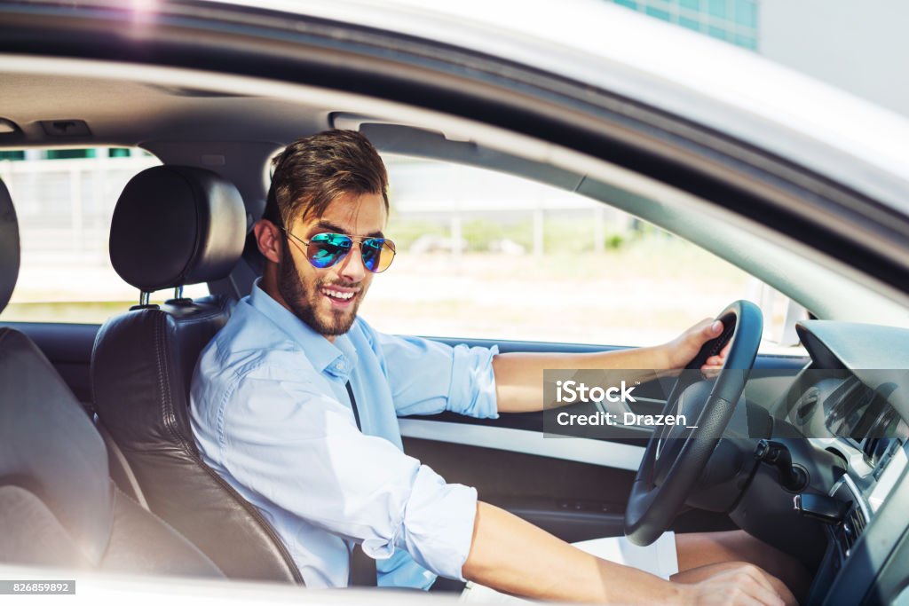 Using Car Pooling Young Man Using Car Pooling Service Stock Photo - Download Image Now ...