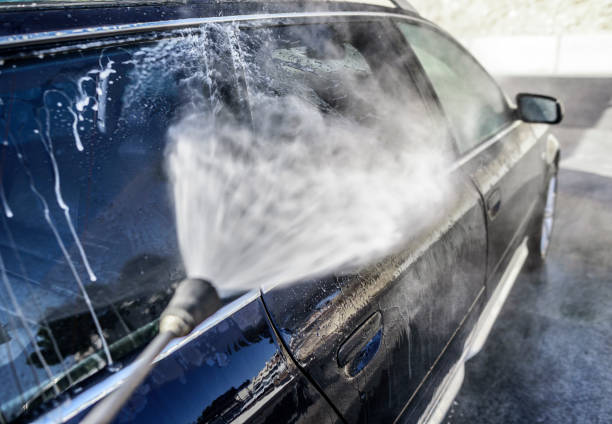 istock High-pressure washing car outdoors 826875568
