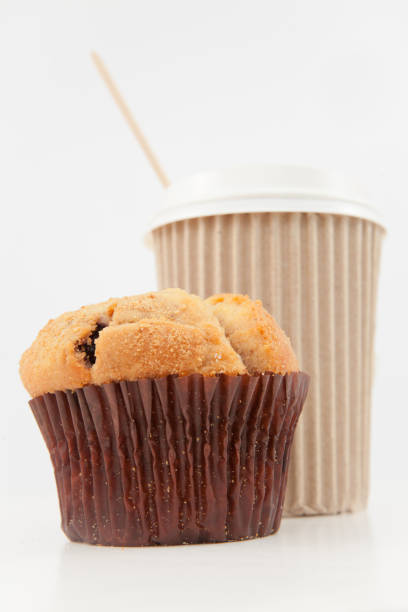 istock Muffin and a cup of coffee placed together 826875826