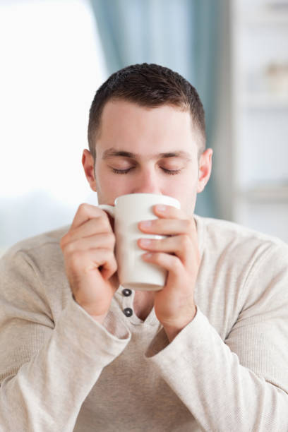 istock Portrait of a calm man having a coffee 826888714