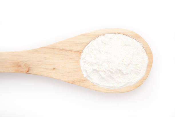 istock Wooden spoon with flour 826903404