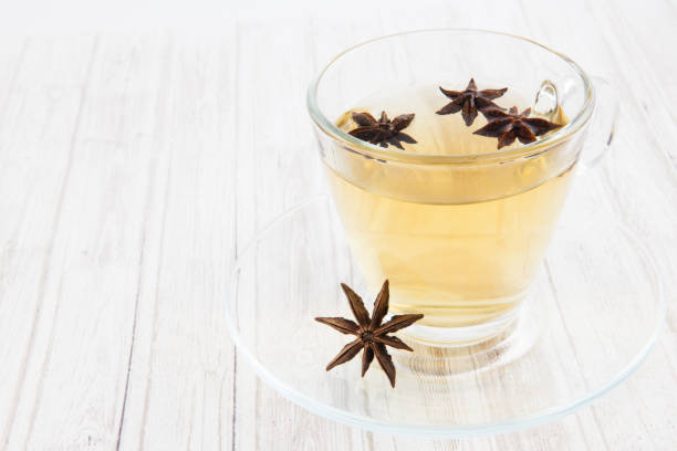 Chamomile and star anise infusion Chamomile (Matricaria chamomilla) and star anise (Illicium verum) infusion anise stock pictures, royalty-free photos & images