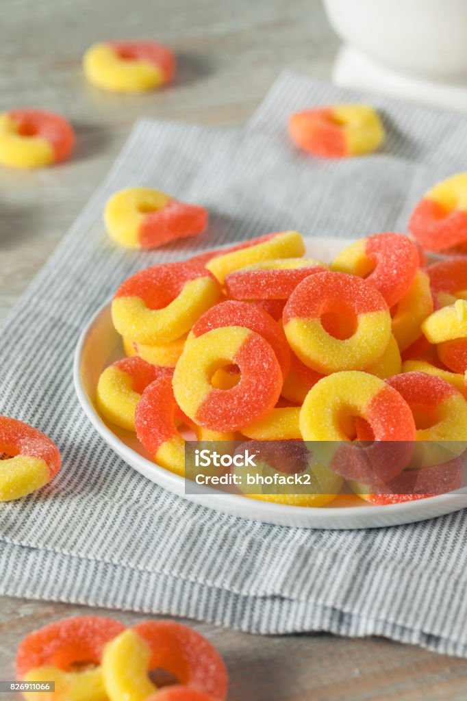 Sweet Sugary Peach Gummy Candy Rings Sweet Sugary Peach Gummy Candy Rings Ready to Eat Backgrounds Stock Photo