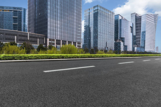istock Empty road front of modern buildings 826917002