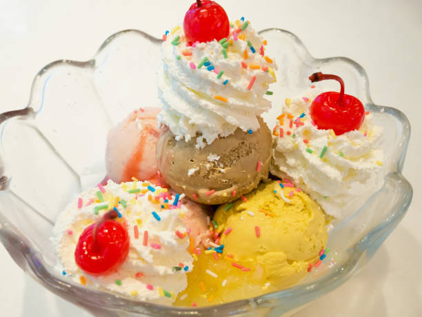 istock Ice cream scoops with whipped cream and cherry 826917068