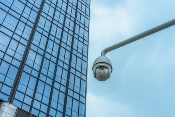 istock Security camera in front of the office building 826917272