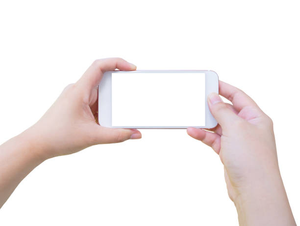 istock Hand holding smart phone taking photo isolated on white background 826917560