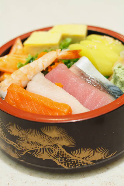 istock Japanese Rice with sashimi on top 826925220
