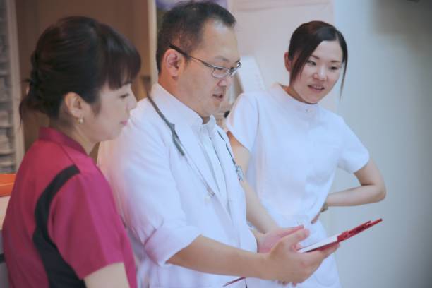 istock Medical staffs discussing at Hospital 826940146