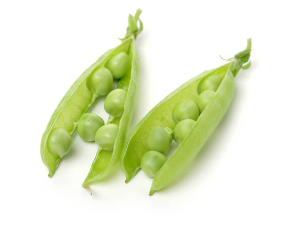 istock Green peas  Isolated on white background 826946964