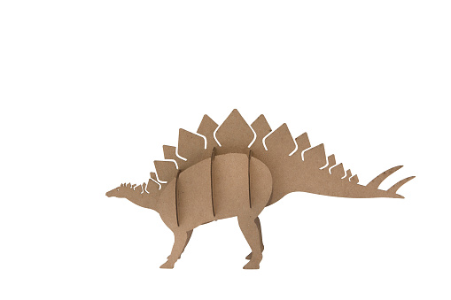 paper dinosaur toy isolated on white background