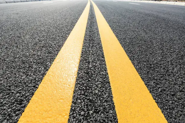 Photo of New asphalt road texture background