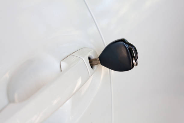 istock Car keys left in the car door 826963484