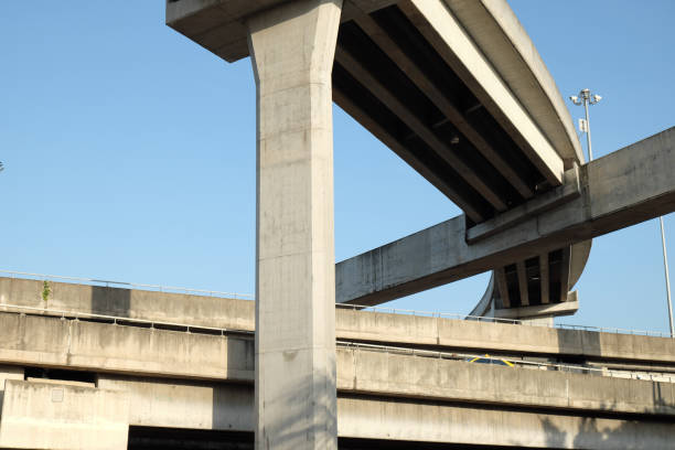istock highway bridge against blue sky background 826970388