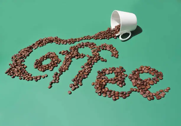 Photo of Handscript Coffee Logo with Coffee Beans