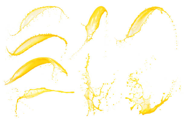 istock Set of orange juice splashes isolated on white background 826973986
