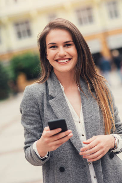 istock Woman texting in the city 826974944