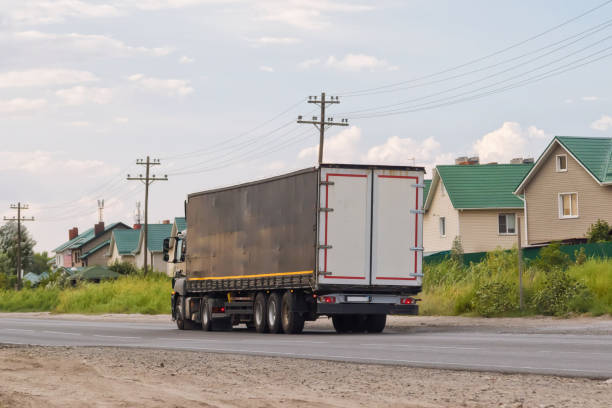 istock Black truck with a black container for shipping cargo 826988810