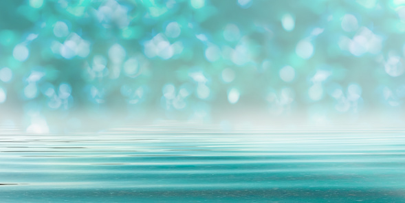 Abstract Blurred Bokeh Forest Background in Turquoise Blue - Spa style with Water