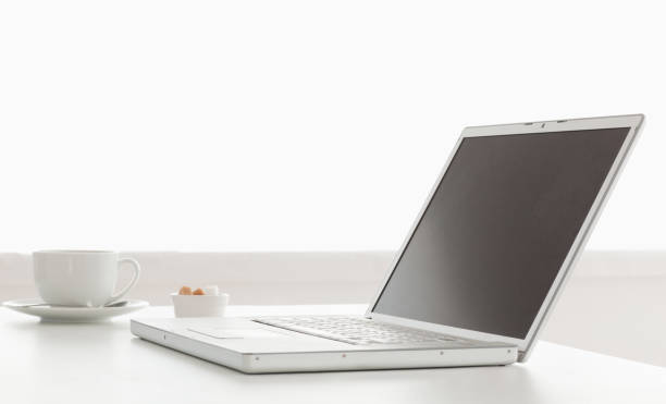 istock Modern and stylish laptop on a table 826998830