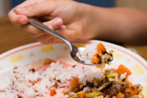 istock Eating the roasted vegetables 826999100