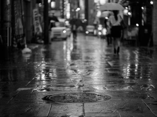 istock manhole in the rain in japan 827000758