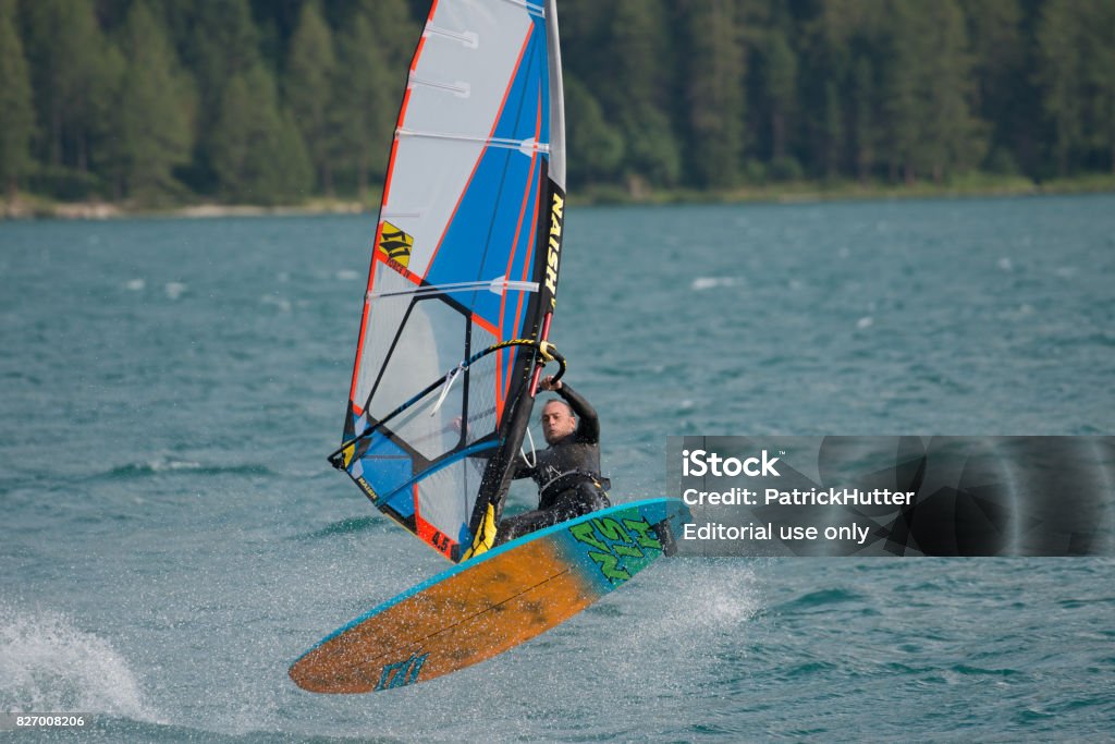 Windsurfing Silvaplana Windsurfing in Silvaplana is unique in Switzerland. The mountains, the clear air and the excellent conditions with the Maloja wind make this region very special. Engadine Stock Photo