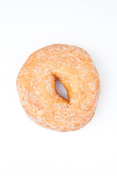 istock Extreme close up of a doughnut with icing sugar 827014192