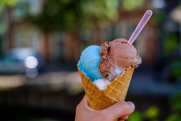 istock Ice cream cone in caucasian hand 827014828