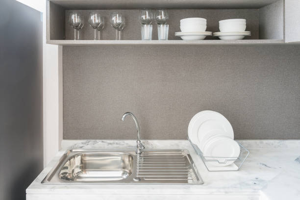 istock modern kitchen room with sink on granite counter top 827015418