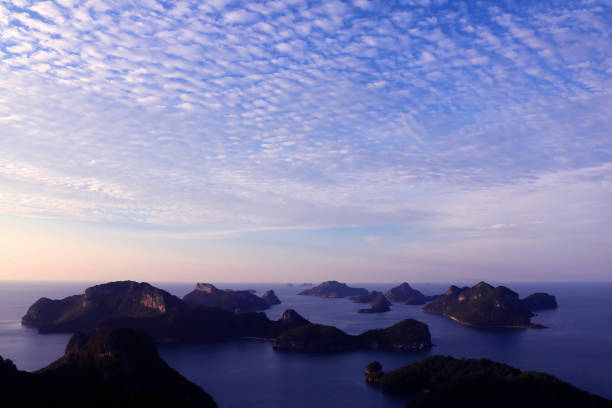 istock Panorama view with purple sunset sky at archipelago island 827018846