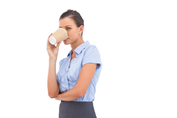 istock Businesswoman drinking cup of coffee 827023076