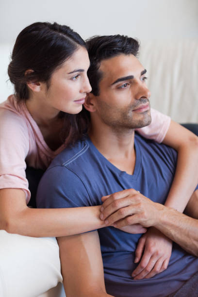 istock Portrait of a young couple posing 827025928