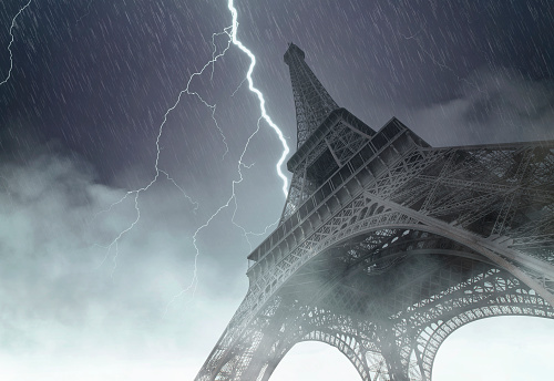 Eiffel tower during the heavy storm, rain and lighting in Paris, creative picture