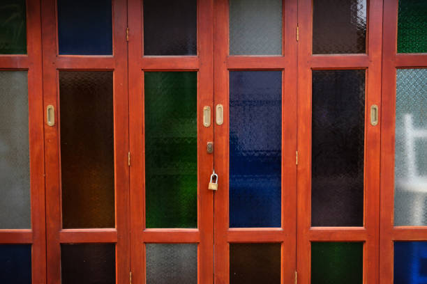 istock Colorful glass on the door. 827029586