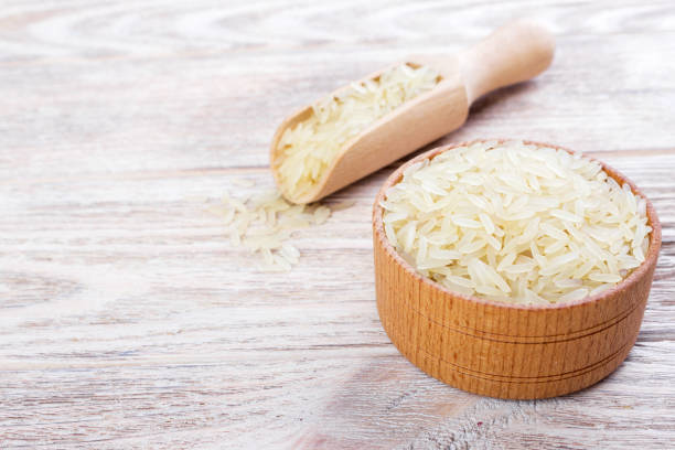 istock A wooden bowl of long grain white rice 827037524