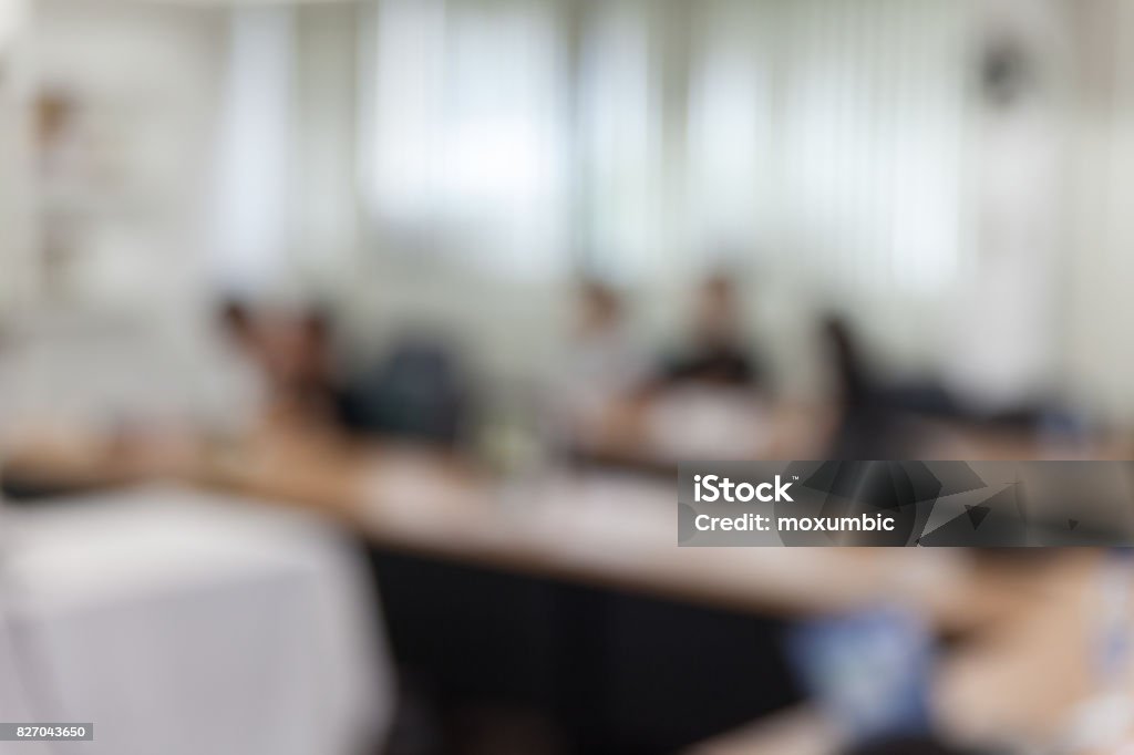 abstract blur people in meeting room Focus On Foreground Stock Photo