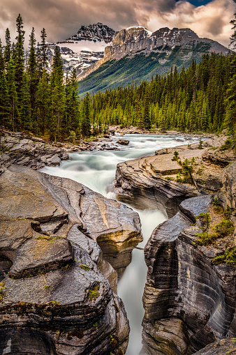 Waterfall at Mistaya Canyon, near The Icefields Parkway, Banff National Park, Alberta, Canada.