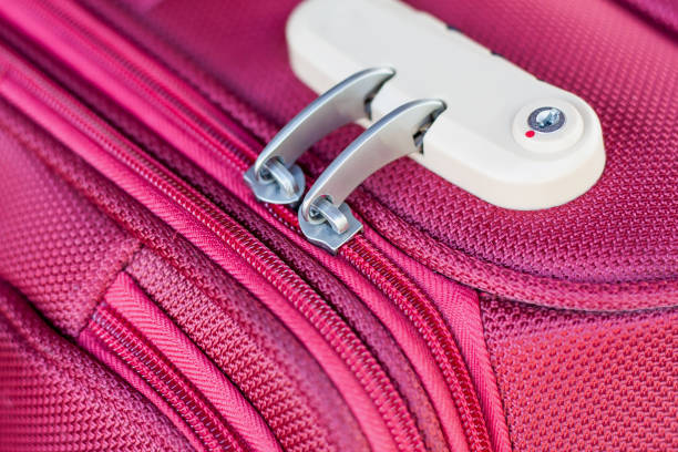 istock combination lock on red suitcase travel bag 827050604