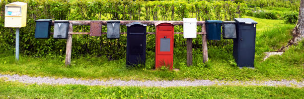 istock Row of various mailboxes in the countryside 827057978